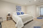 Master suite renders a king-sized mattress, offering wide open spaces -basement floor-